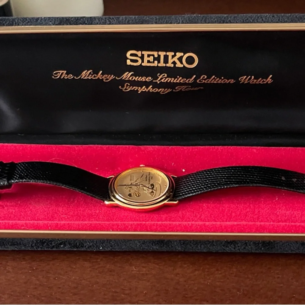 Seiko Gold-Tone Watch with Black Strap - Picture 1 of 7